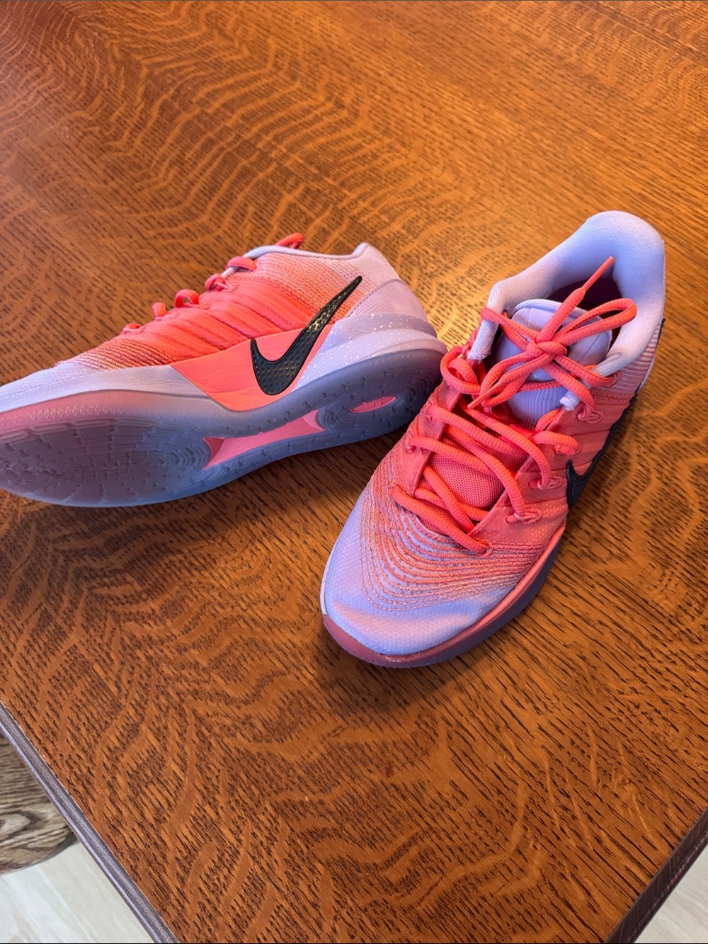 Nike Women’s Coral Pink Training Sneakers with Black Swoosh